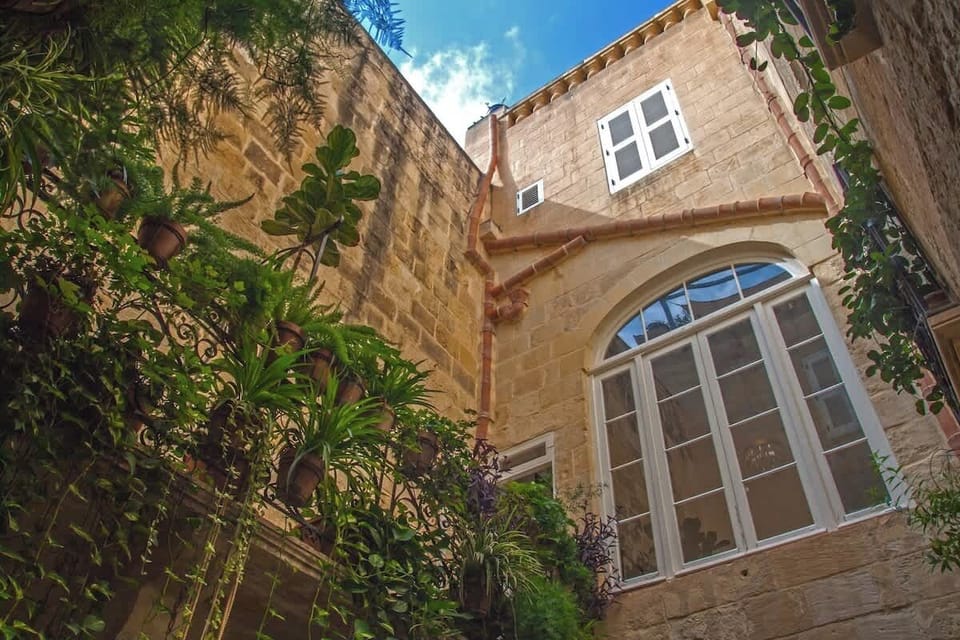 Look up and catch a glimpse of your private suite, where comfort and style await your arrival.