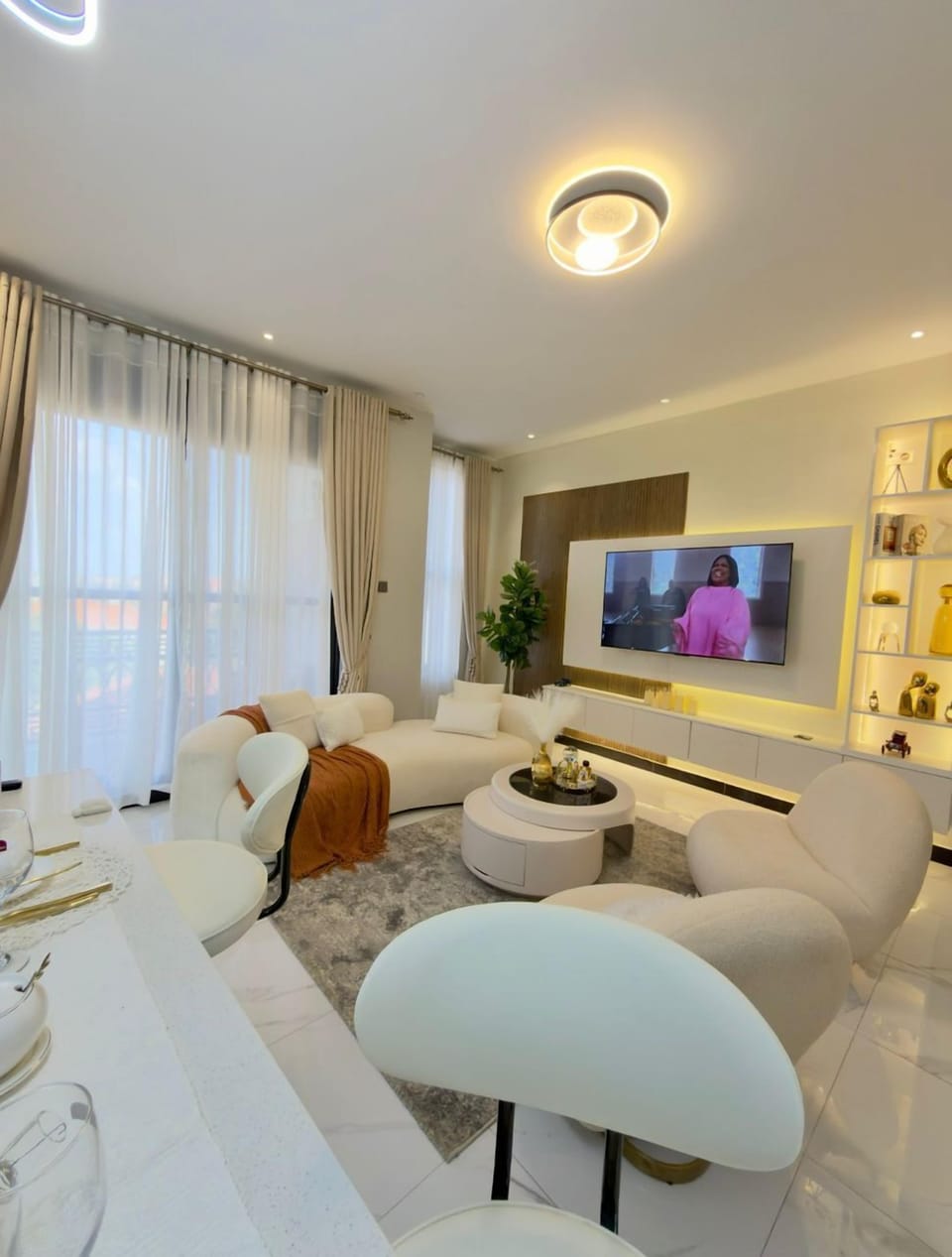 Deluxe Apartment, Balcony, City View | Living area | Flat-screen TV