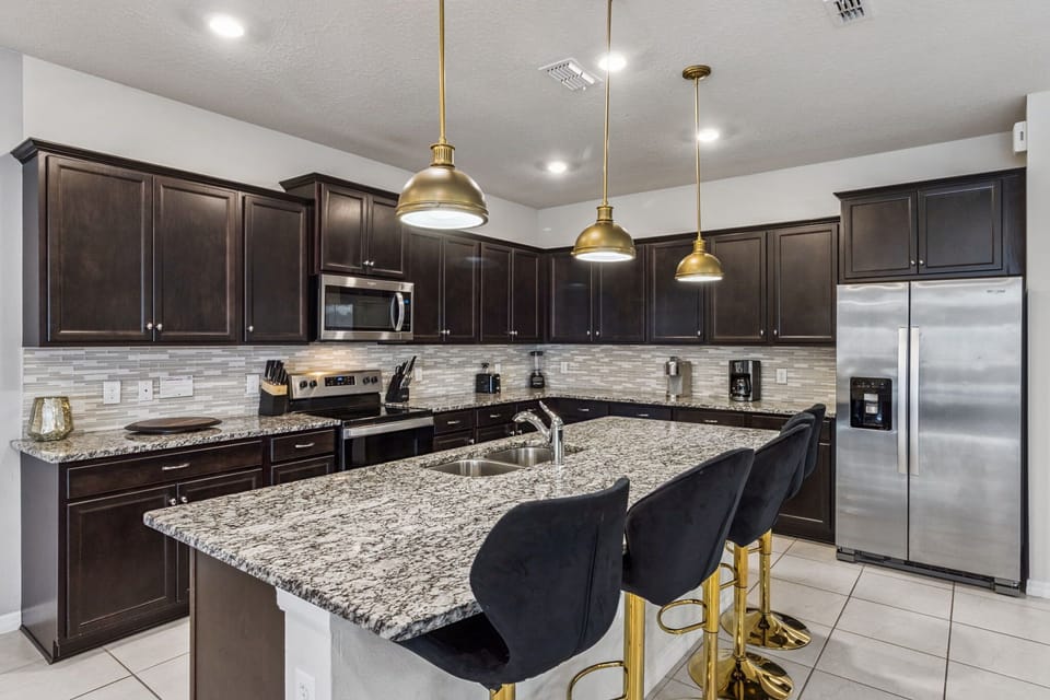 Fully equipped modern kitchen with everything you need for family meals and group cooking.