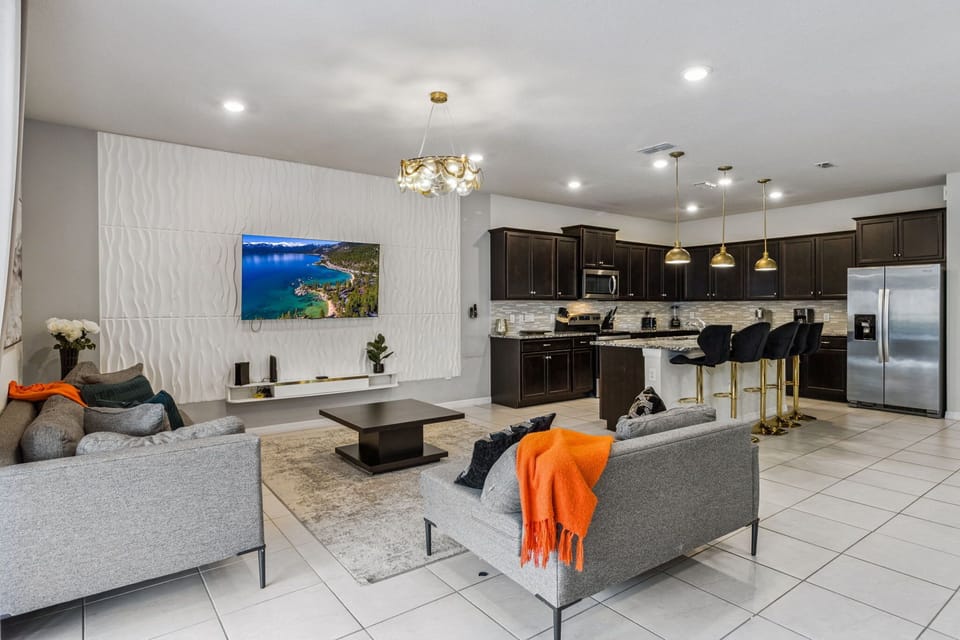 Comfortable open living area designed for gathering, movie nights, and time together.