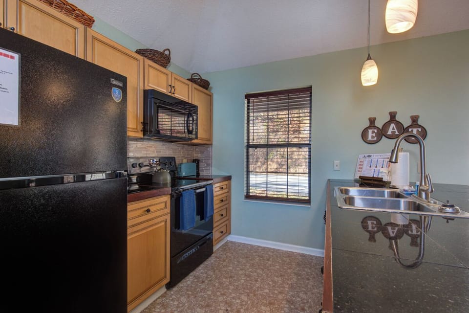 Your fully equipped kitchen awaits with modern appliances and charming details, perfect for preparing meals during your stay.