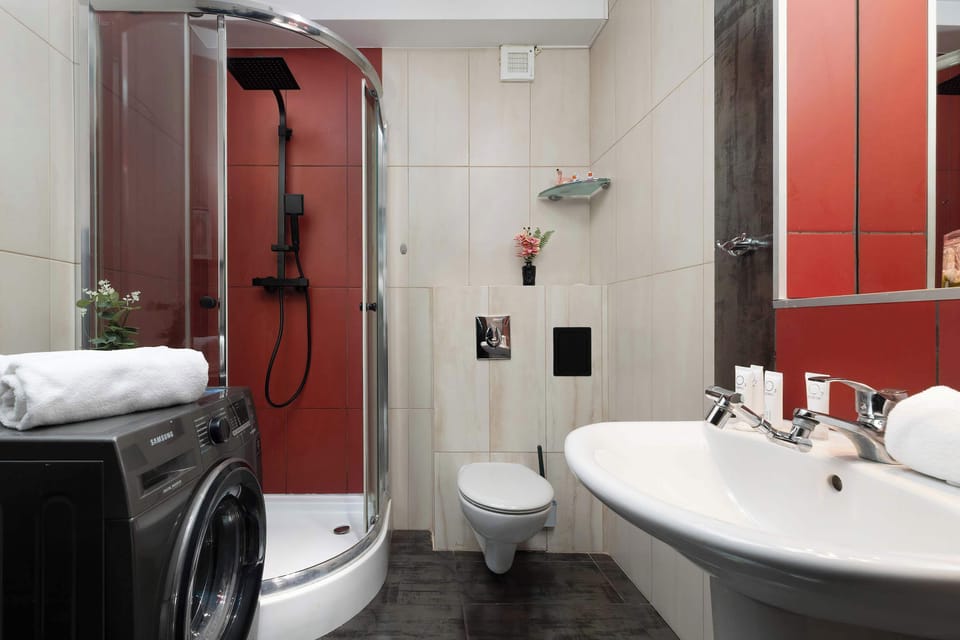 The bathroom's stylish design provides a relaxing environment.