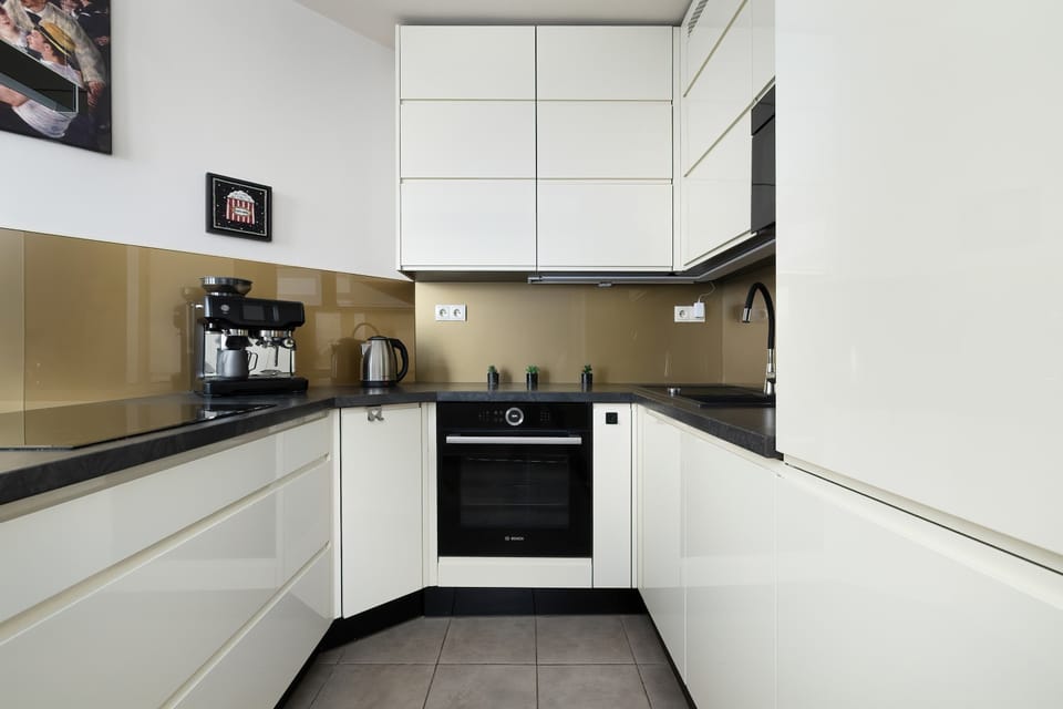 The kitchenette's practical layout maximizes space and functionality.