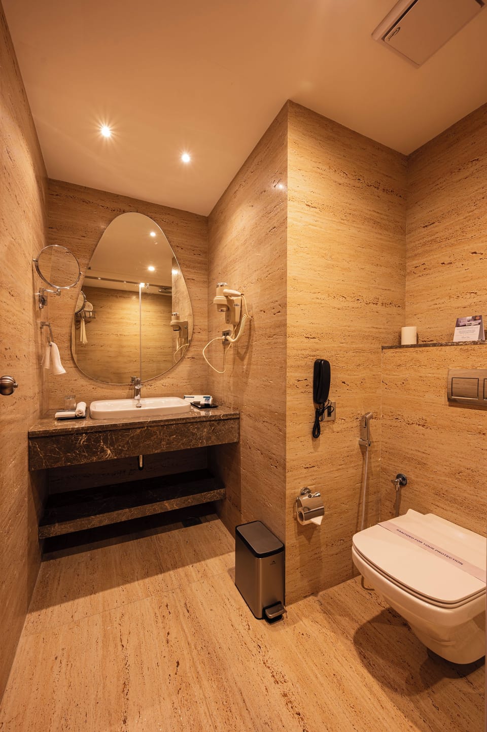 Shower, hair dryer, slippers, towels
