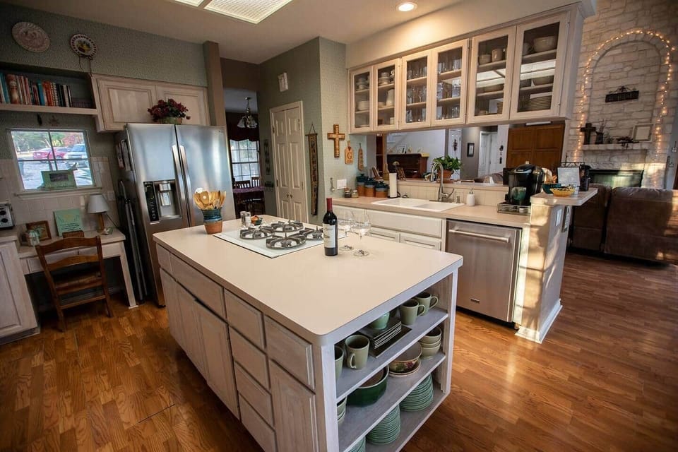 Kitchen opens into living area.