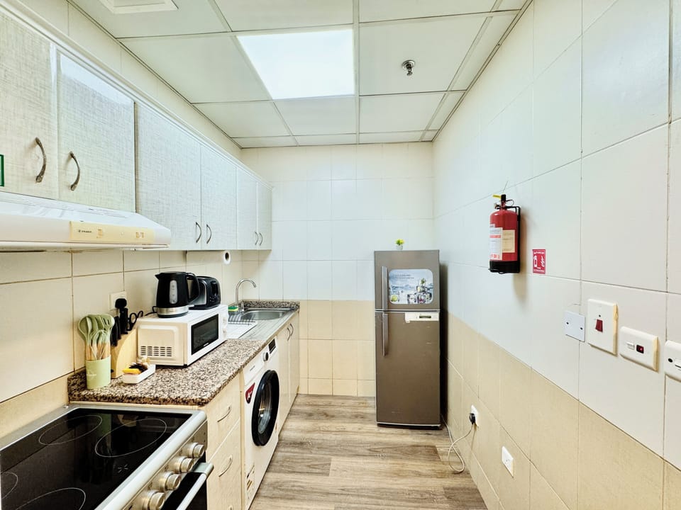 Business Apartment, City View | Private kitchen | Full-size fridge, microwave, oven, stovetop