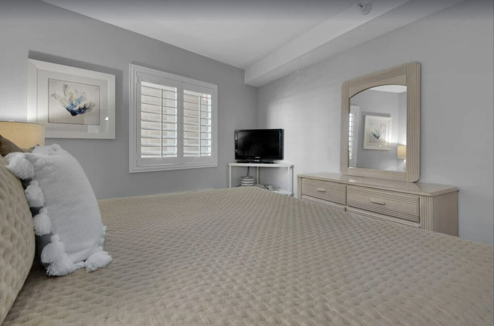 King Master Bedroom with TV and Dresser