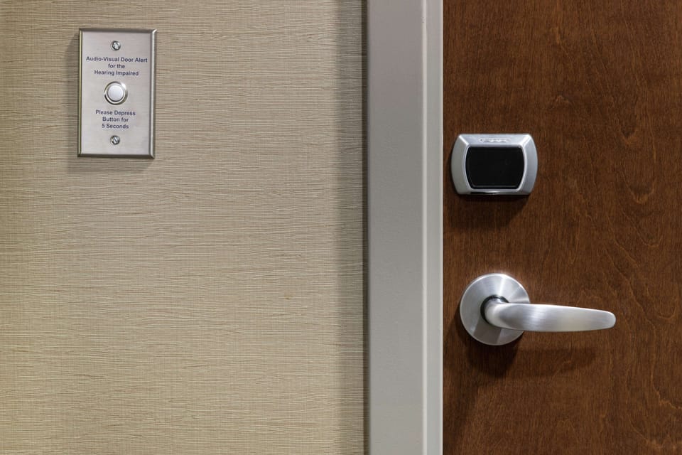 Desk, laptop workspace, iron/ironing board, free cribs/infant beds