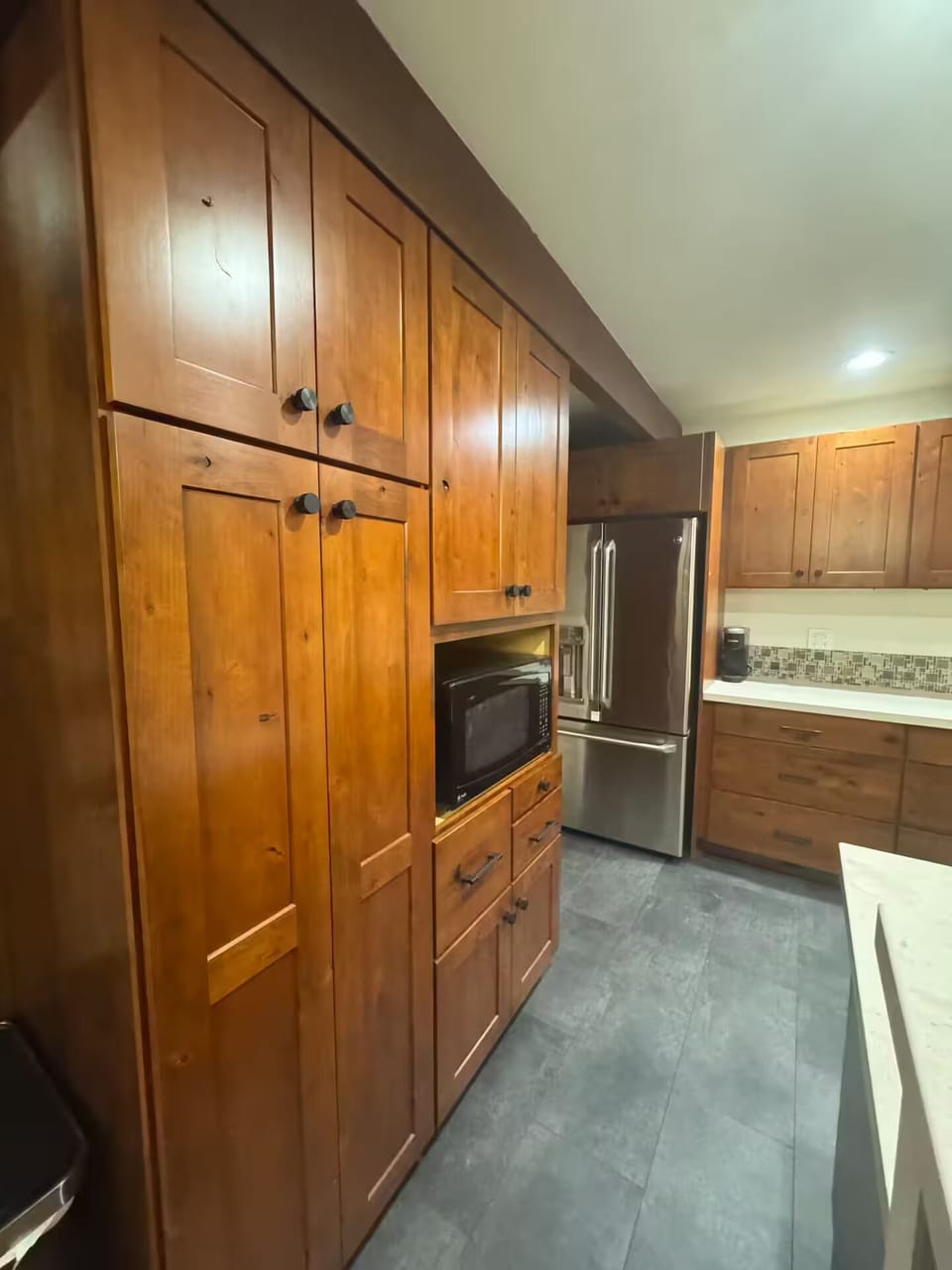 Pantry for your food that will be open and not full of dishes for you