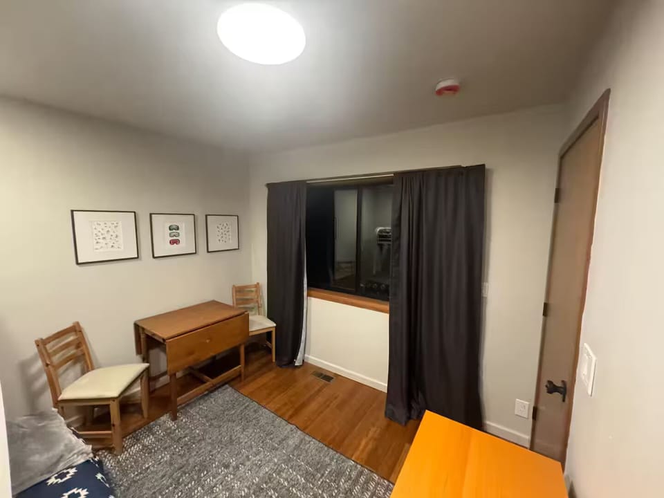 Kids bunk room has extra table and chairs that can be used in the kitchen too