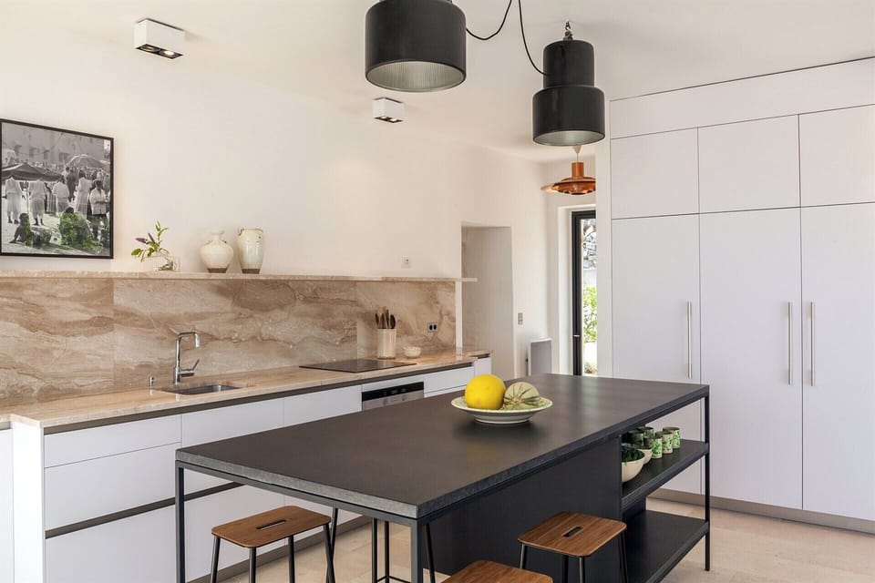 The well-equipped kitchen has plenty of space for cooking up a feast.