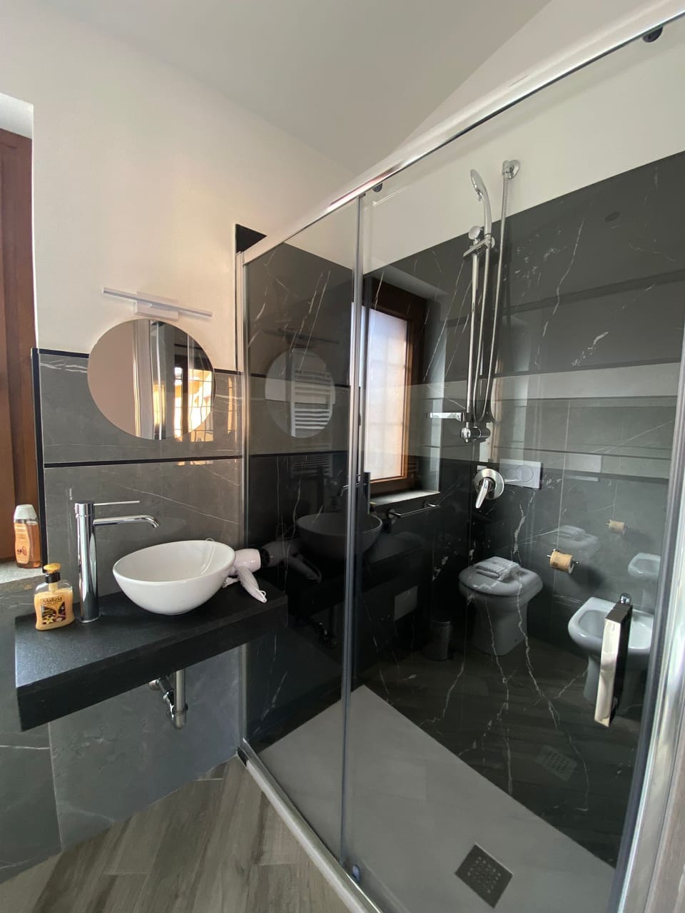 Triple Room | Bathroom | Shower, hair dryer, bidet, towels