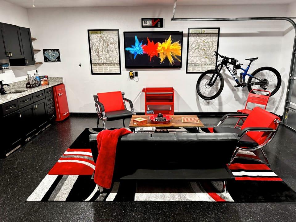 Game Room/Bike Lounge: Vibrant space with modern decor, and a retro feel for fun