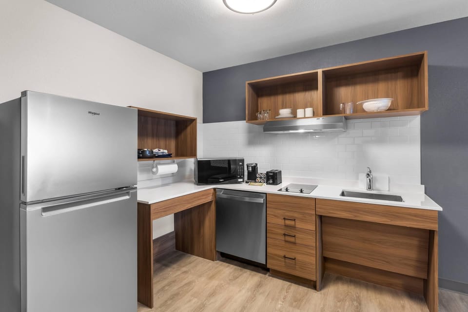Suite, 1 King Bed, Non Smoking | Pillowtop beds, desk, laptop workspace, iron/ironing board