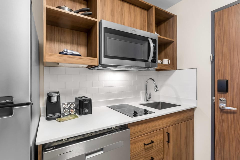 Suite, 1 King Bed, Non Smoking | Pillowtop beds, desk, laptop workspace, iron/ironing board