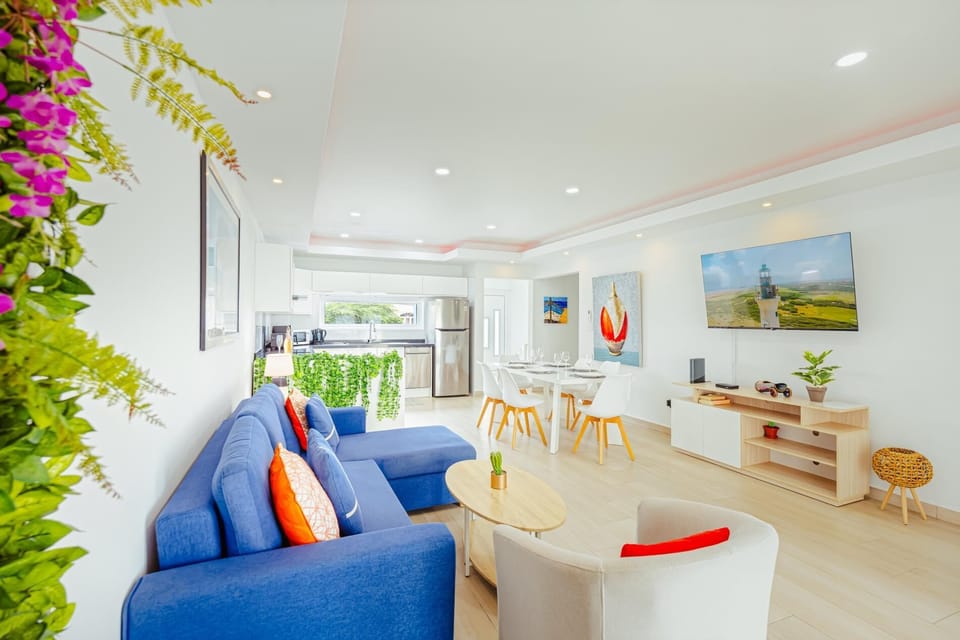 Step into a bright, open-concept living space designed for making memories. Whether you’re gathering for a movie night or sharing a home-cooked meal, this vibrant heart of the home offers the perfect blend of style and relaxation.