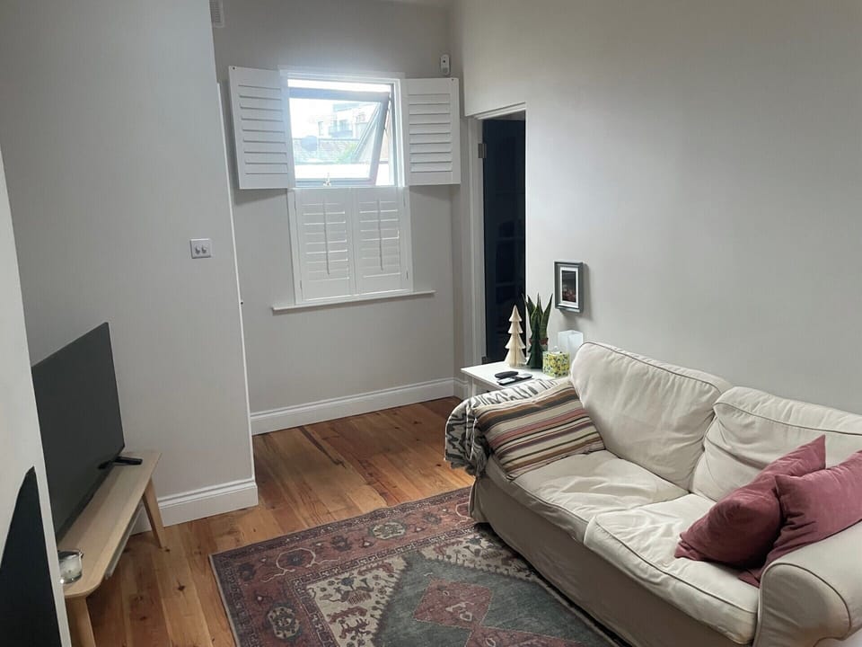 Cosy living room with central heating, stove fire 