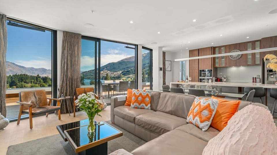 Living room with stunning views and cosy fireplace. 