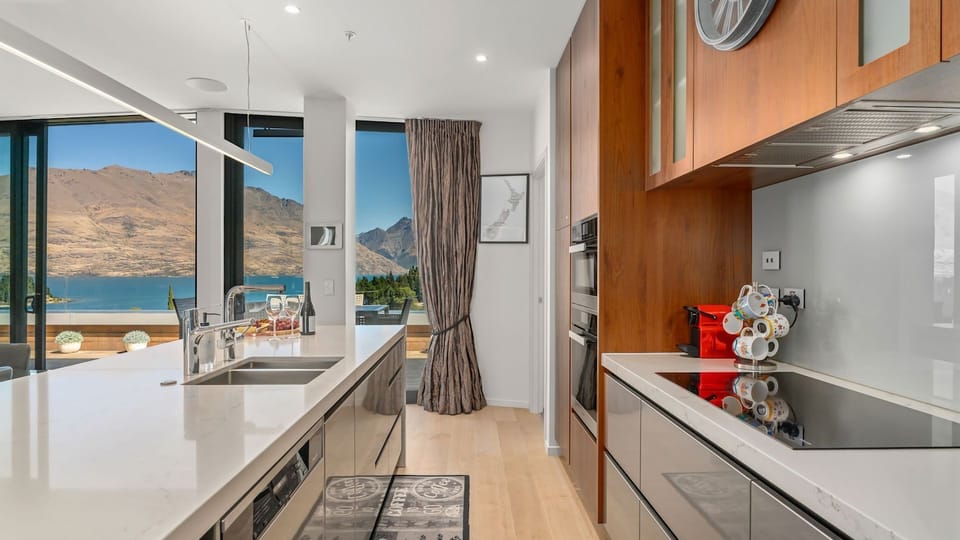 Full kitchen with modern appliances. 
