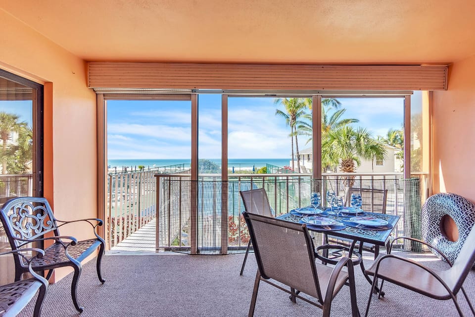 Balcony and hangout area with water view