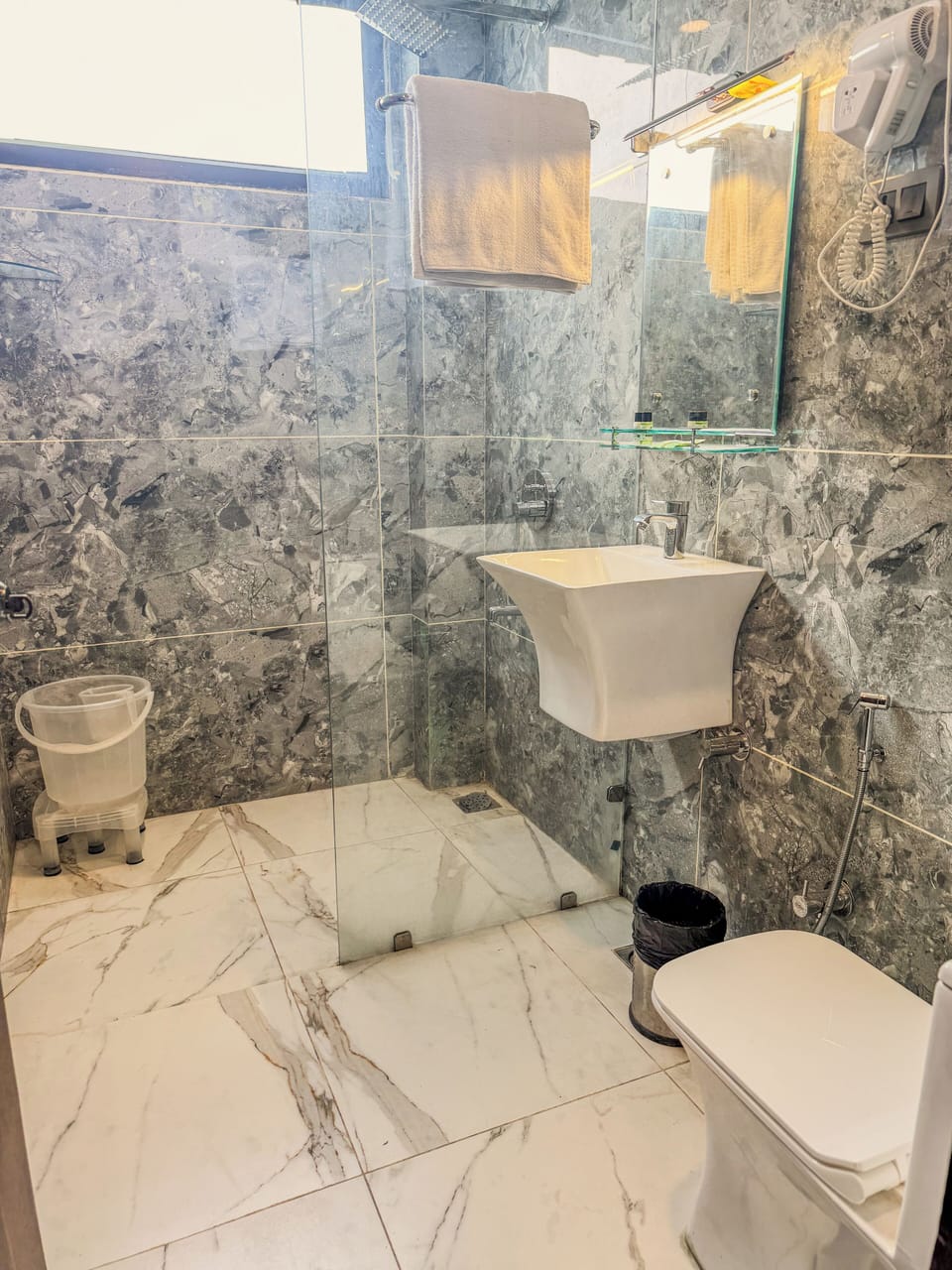 Shower, hair dryer, soap, shampoo