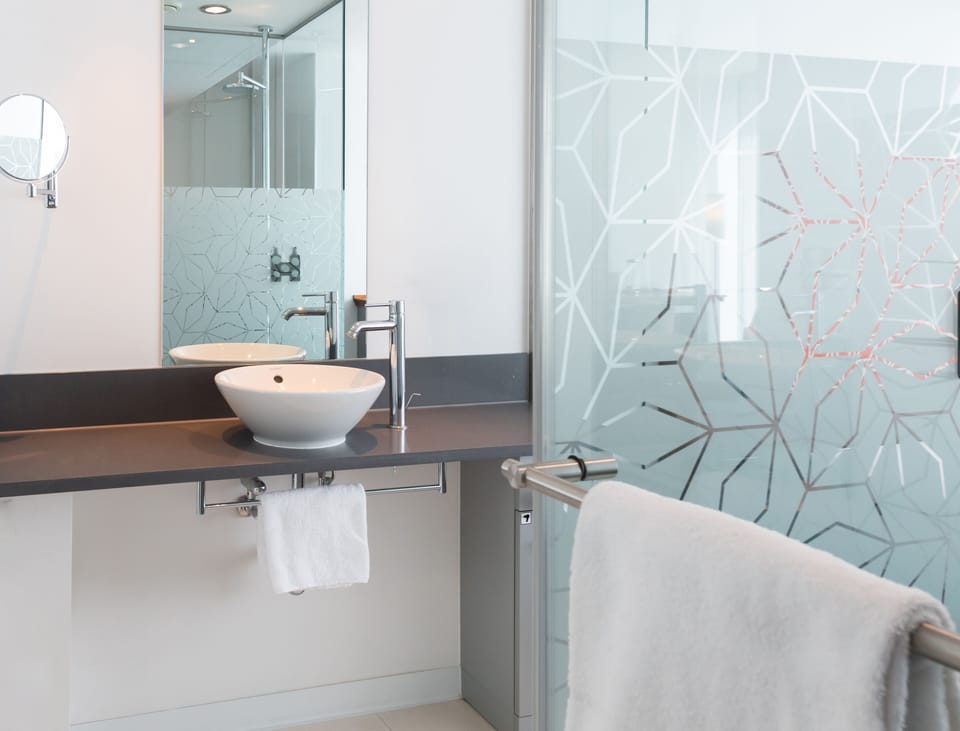 Suite, 1 Bedroom | Bathroom | Combined shower/tub, free toiletries, hair dryer, slippers