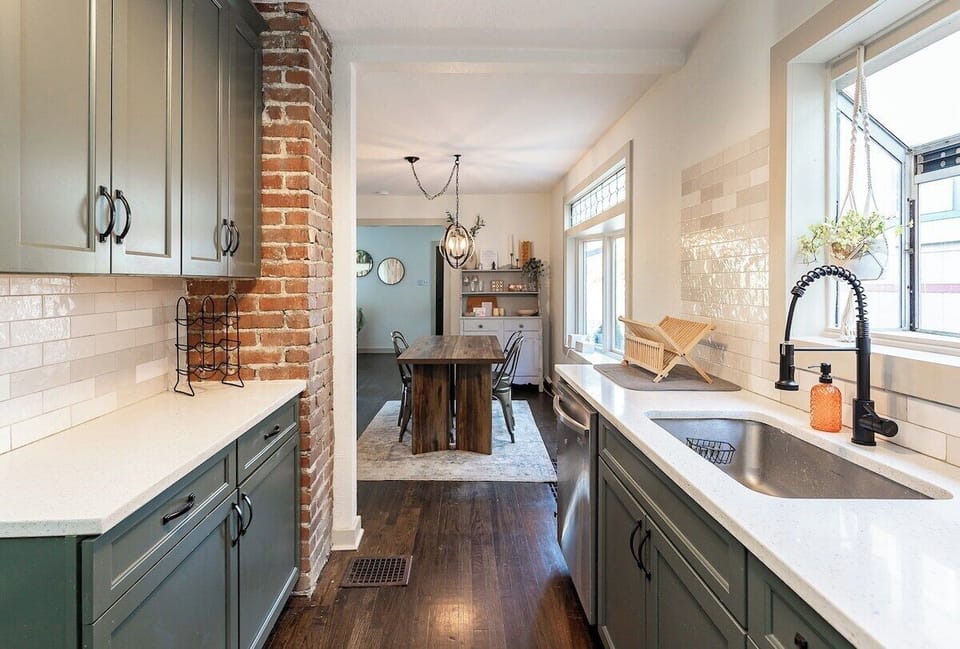 Open layout with natural light, upgraded finishes, and convenient access to the dining room—perfect for shared meals and gathering with friends or family.