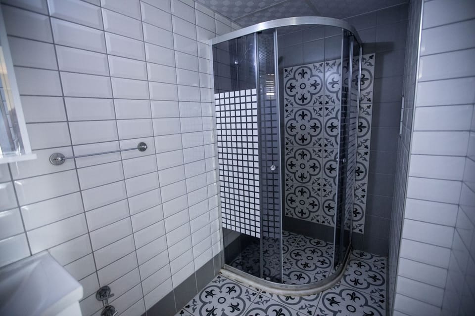 Comfort Triple Room, Balcony, City View | Bathroom | Shower, hair dryer, towels, soap