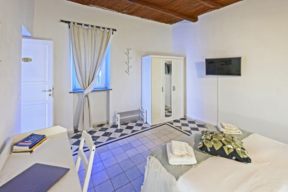 Double Room, Garden View | Desk, laptop workspace, blackout drapes, iron/ironing board