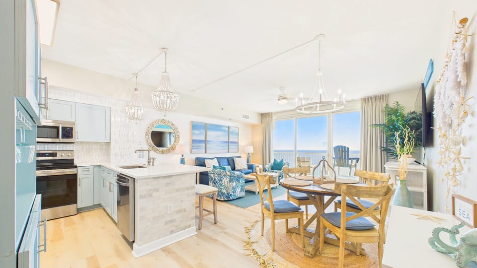 Living space with full kitchen and dining table