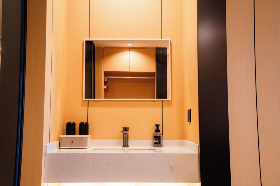 Comfort Single Room, City View | Bathroom | Separate tub and shower, rainfall showerhead, hair dryer, slippers