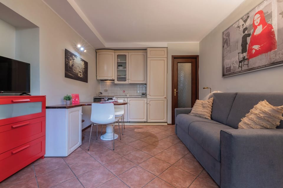 Basic Apartment, Balcony | Living area | 35-cm TV with digital channels