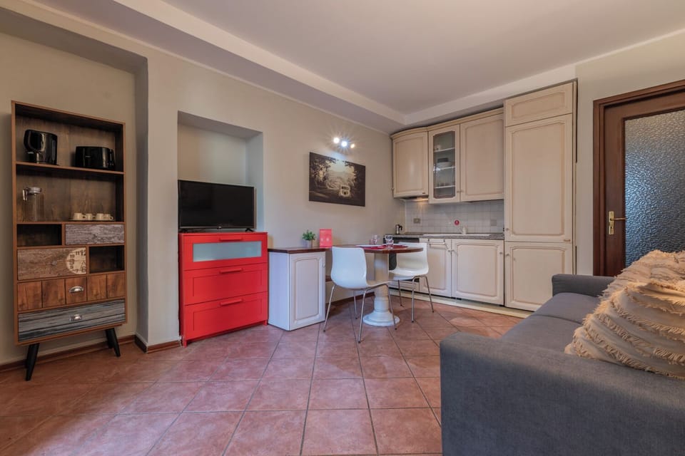 Basic Apartment, Balcony | Living area | 35-cm TV with digital channels