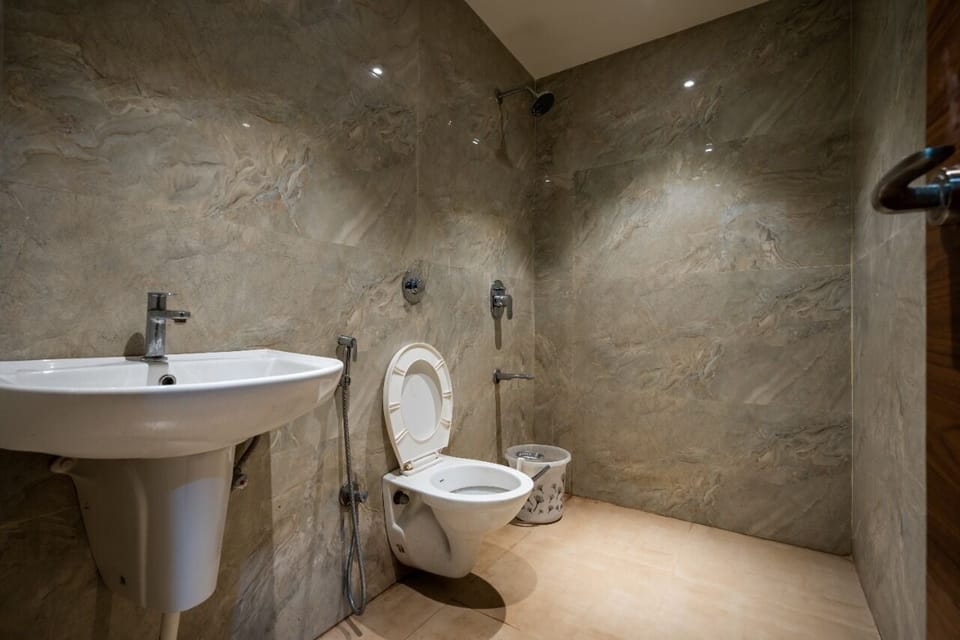 Shower, slippers, towels, soap