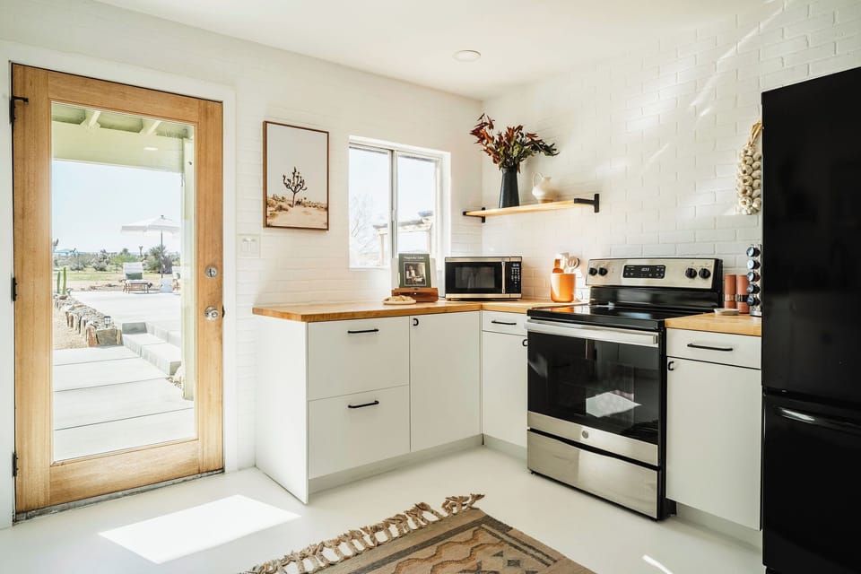 Fully stocked kitchen with spices, cookware, and everything you need to cook with ease.
