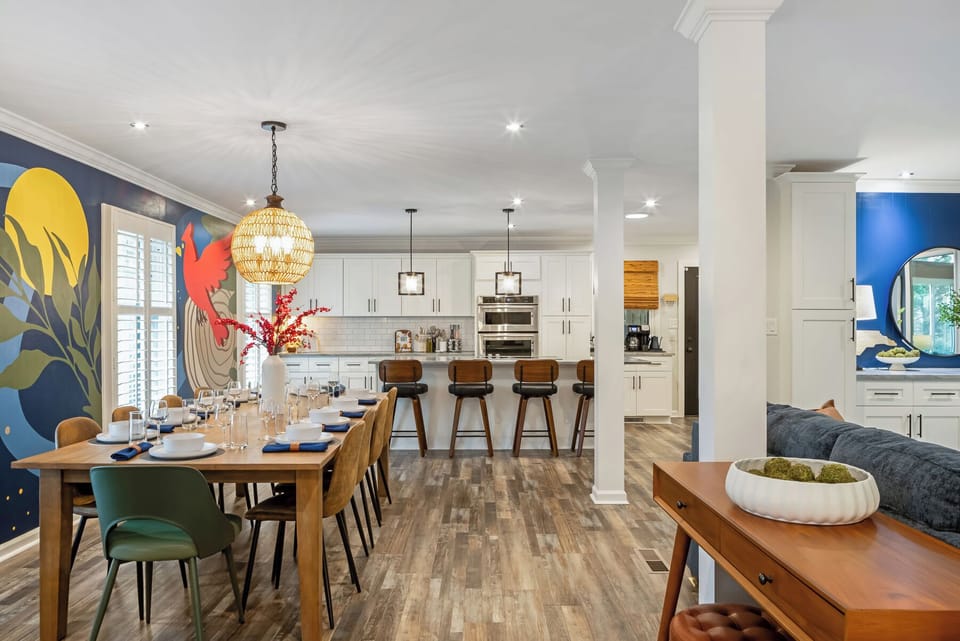 Host the whole group—14 seats split between table and bar.