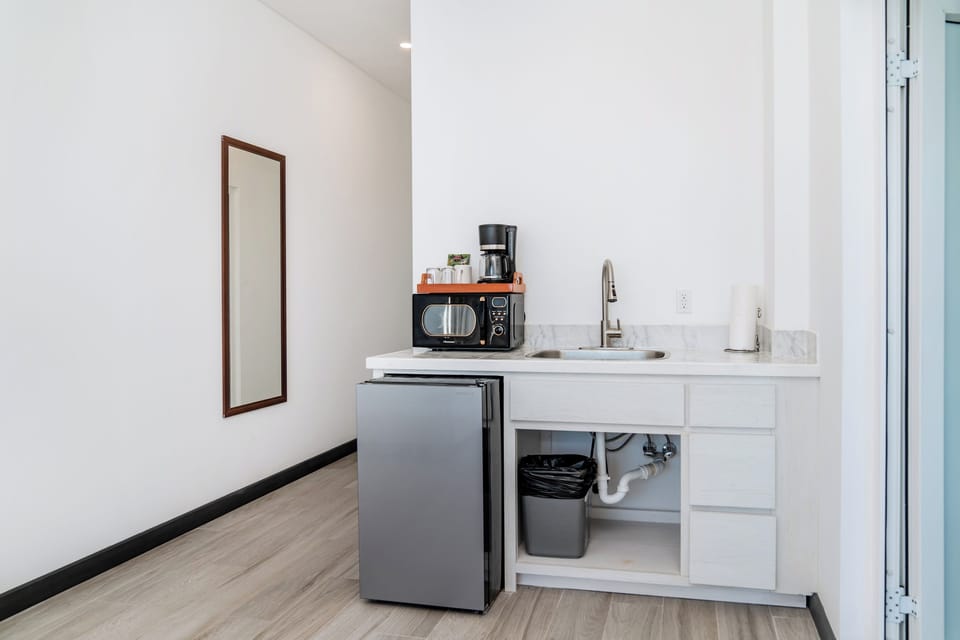 Sink, mini fridge, microwave, coffee maker