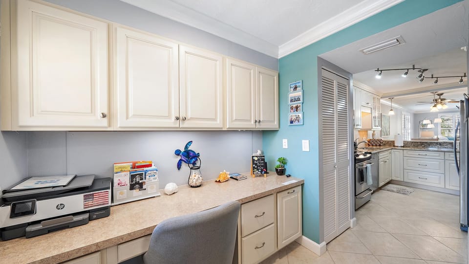 Your fully equipped kitchen features granite countertops, modern appliances, and a convenient workspace area for all your culinary needs during your stay.