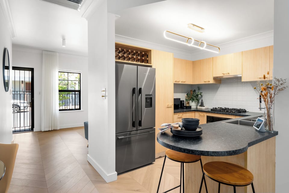 The kitchen is fully equipped with everything you need for simple meals, including an oven, stove, microwave, dishwasher, fridge and a Nespresso machine for easy morning routines. 