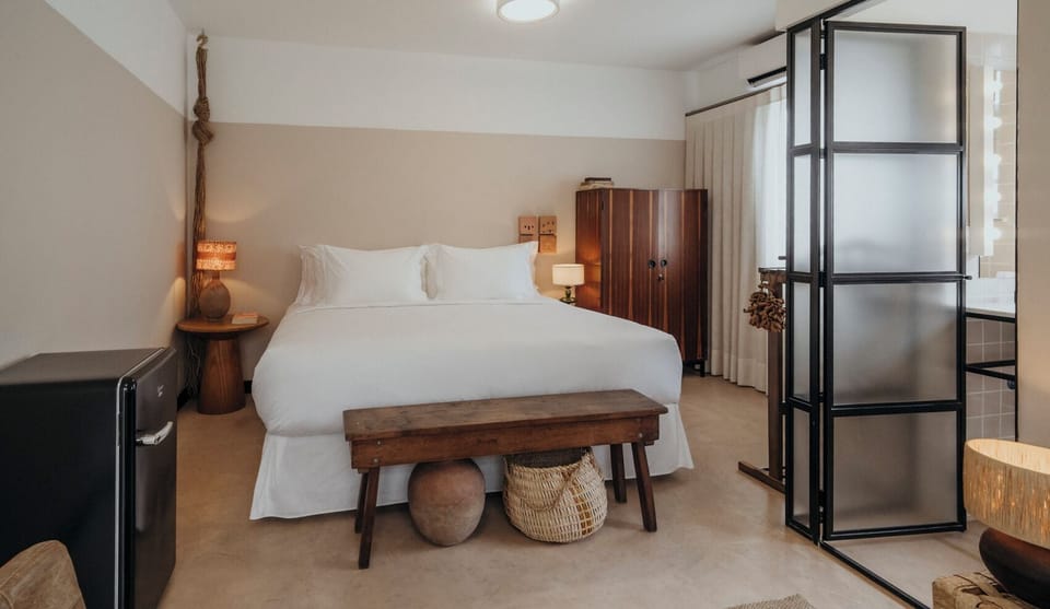 Standard Twin Room | Minibar, in-room safe, individually decorated, blackout drapes