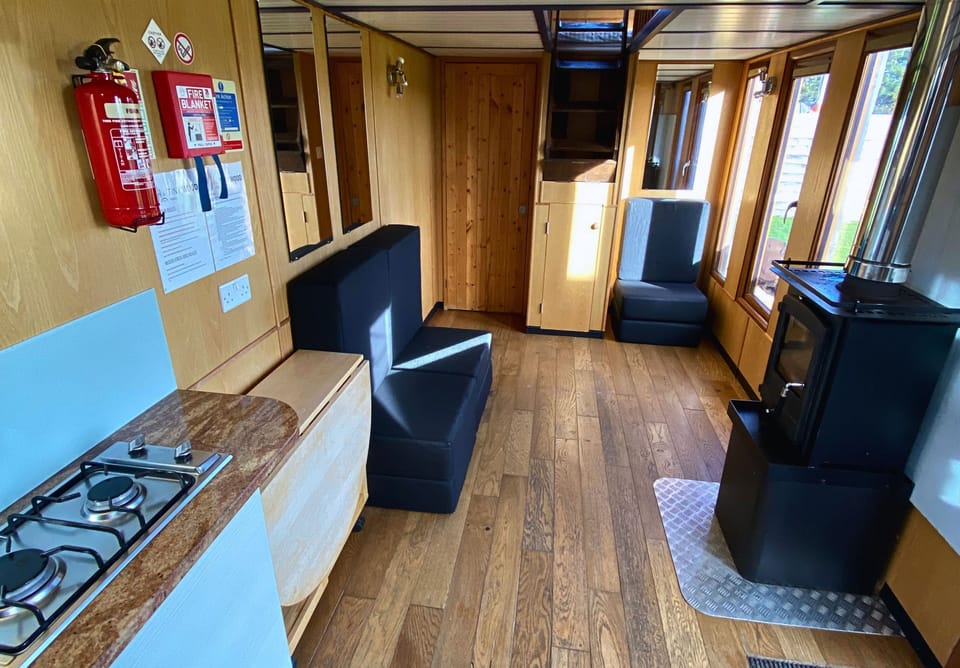 Open-plan living room with a kichenette