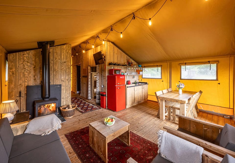 Open-plan kitchen, dining and sitting area, glamping in Yorkshire