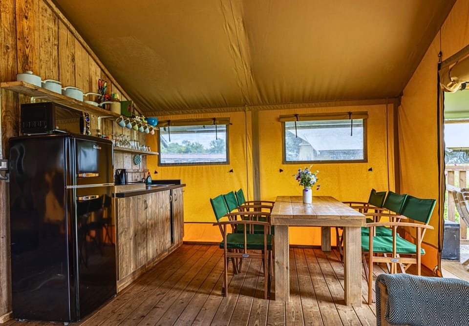 Open-plan dining area and fully equipped kitchen