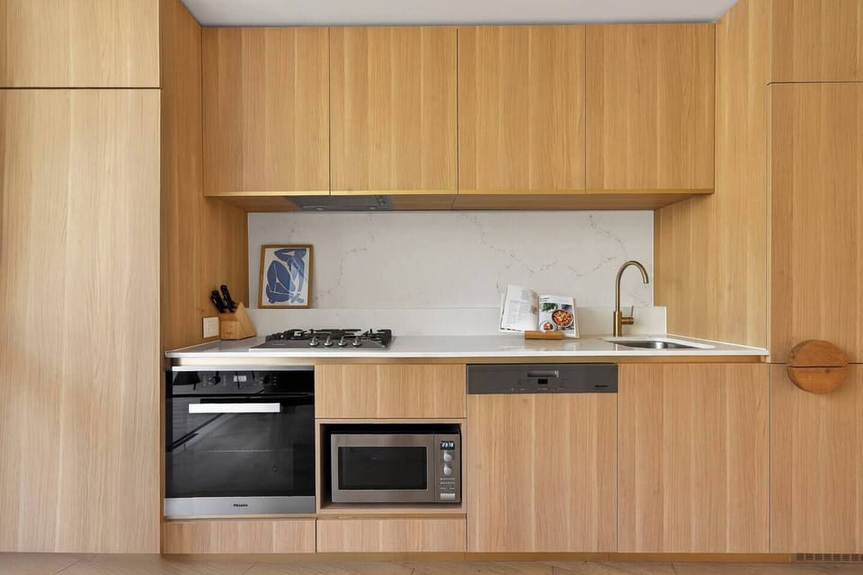 Prepare your favourite dishes in a beautifully appointed kitchen where modern appliances and elegant finishes make cooking feel easy and enjoyable.