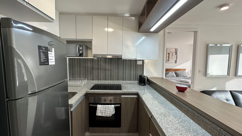 B4 Depto Single | Private kitchen | Full-size fridge, microwave, oven, stovetop