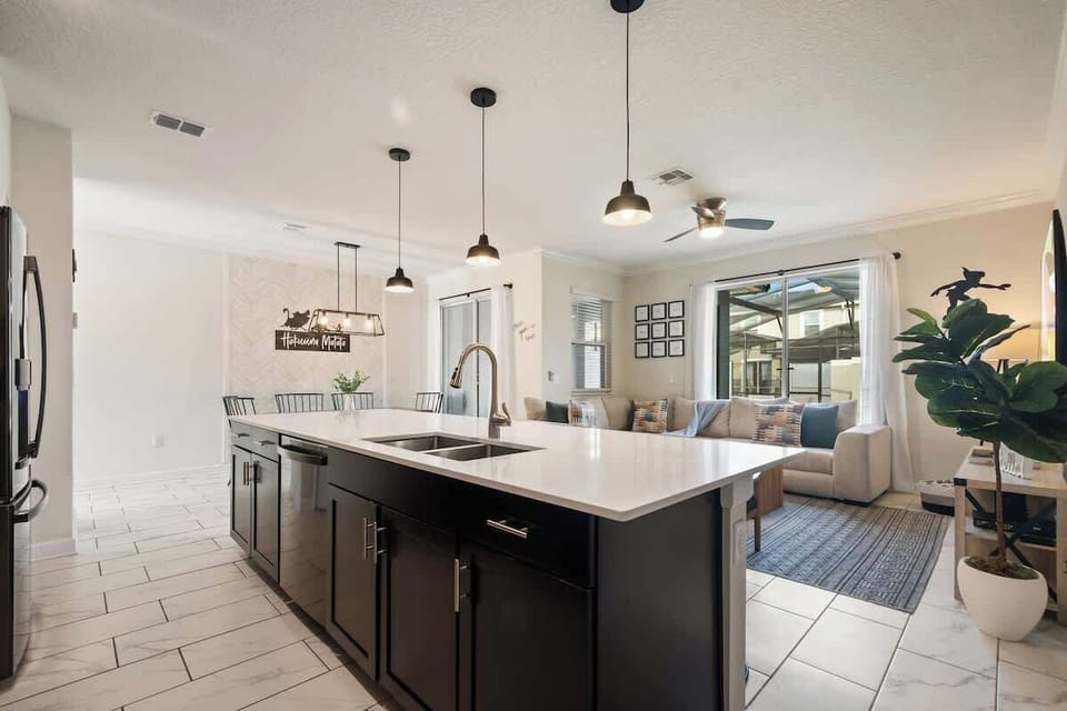 With its sleek design and spacious layout, this kitchen becomes the heart of every gathering. Enjoy breakfast with family, prepare dinner with friends, and savor time together in a bright, welcoming setting.