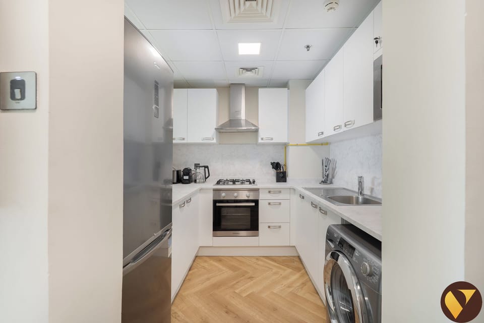 Luxury Apartment, Balcony, Pool View | Private kitchen | Microwave, oven, stovetop, electric kettle