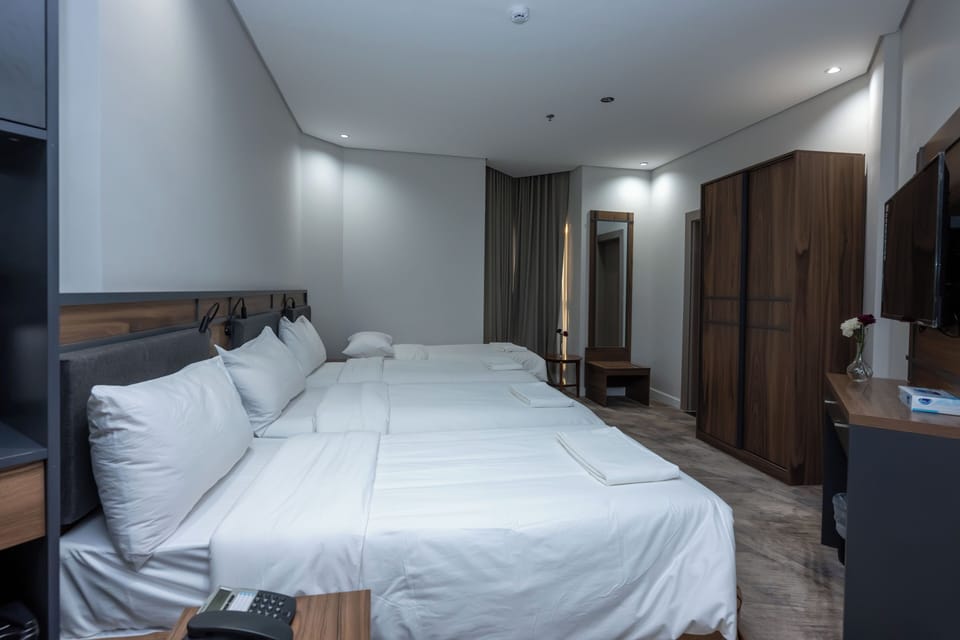 Deluxe Quadruple Room | Free WiFi, bed sheets