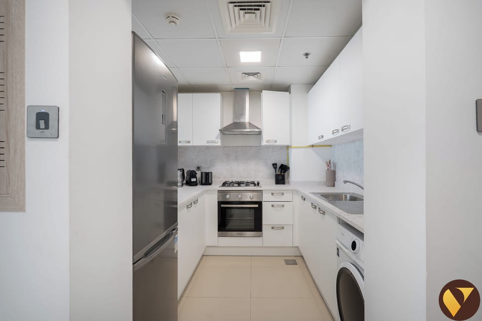 Luxury Apartment, Balcony, City View | Private kitchen | Full-size fridge, microwave, oven, stovetop