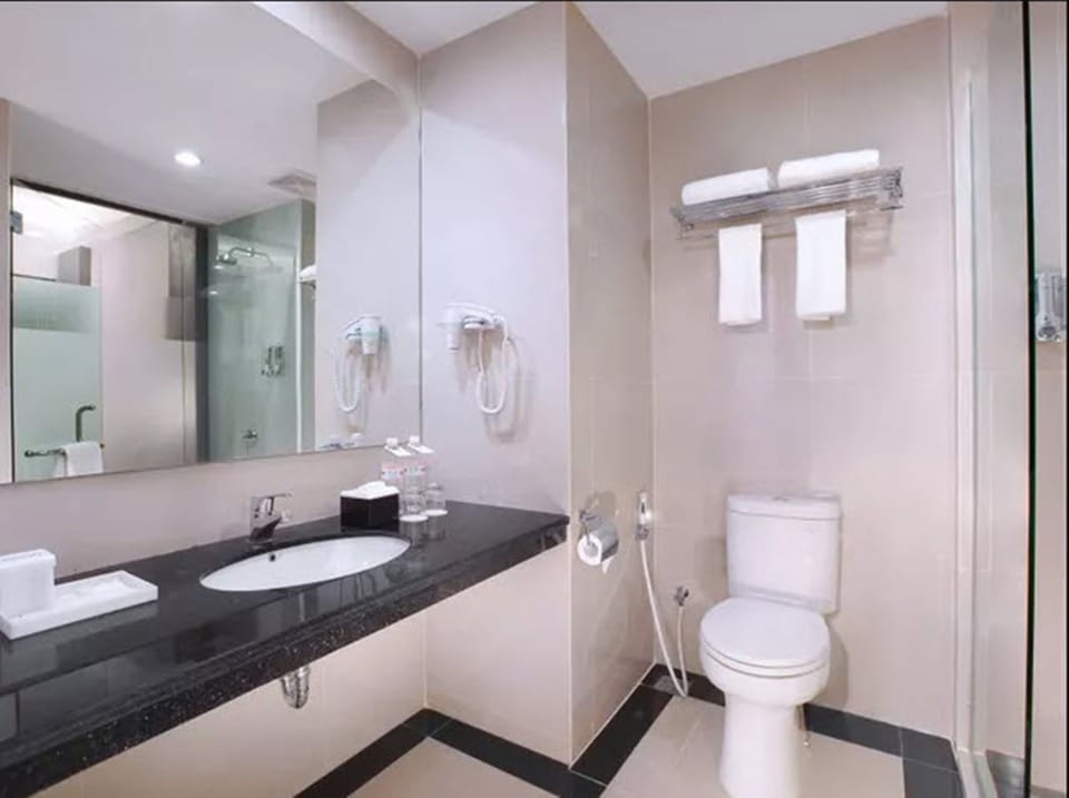 Shower, bathrobes, slippers, towels